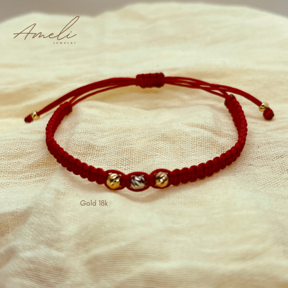THREE GOLDS RED WOVEN BRACELET