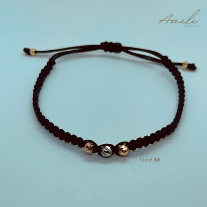 THREE GOLDS BLACK WOVEN BRACELET